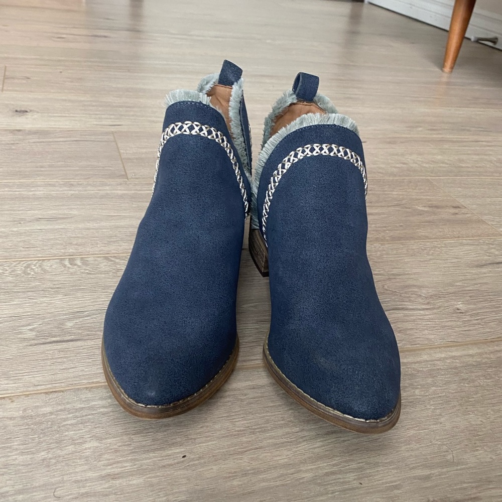 Blue booties with detailed trim